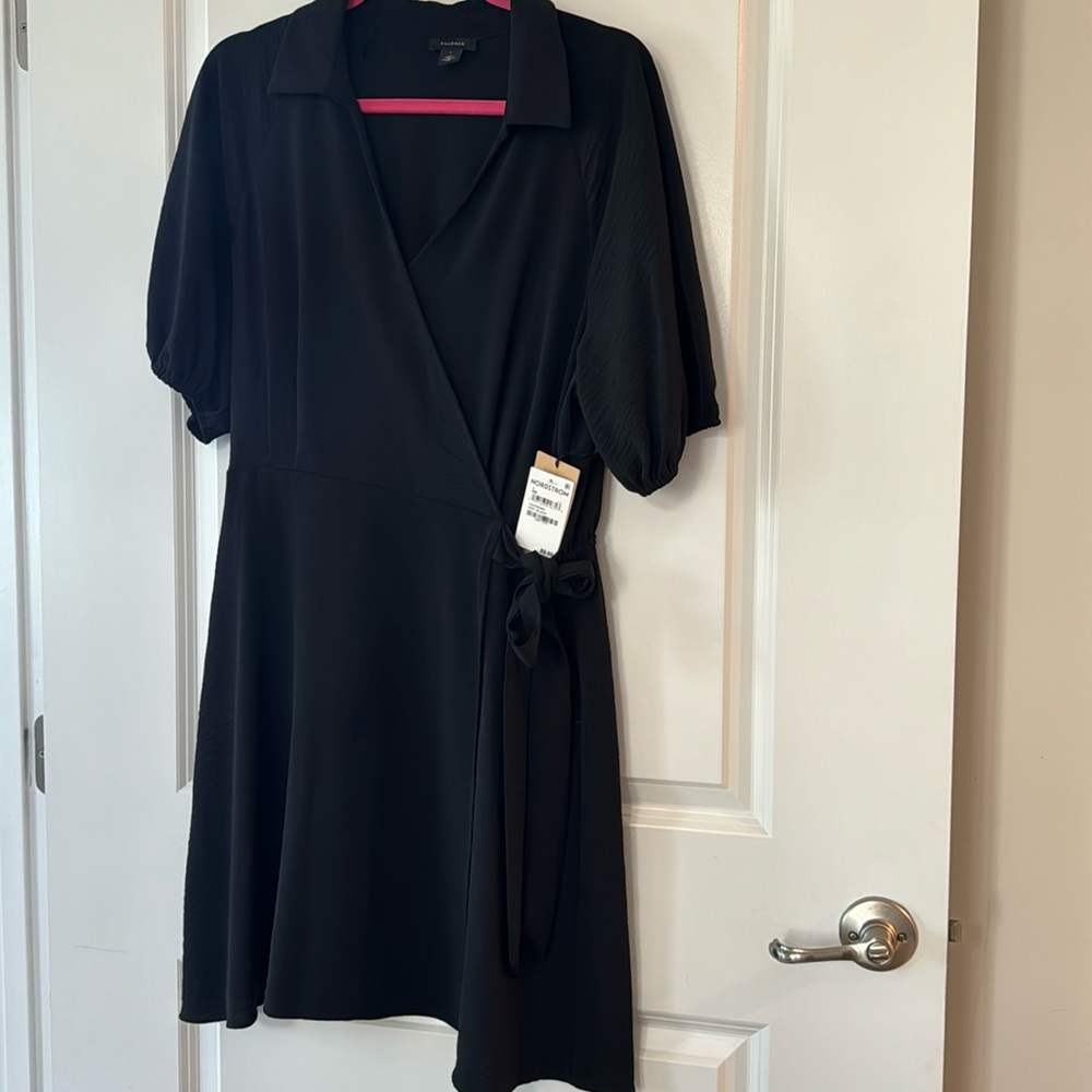 Short sleeved faux black wrap dress can be dressed up for evening or casual day